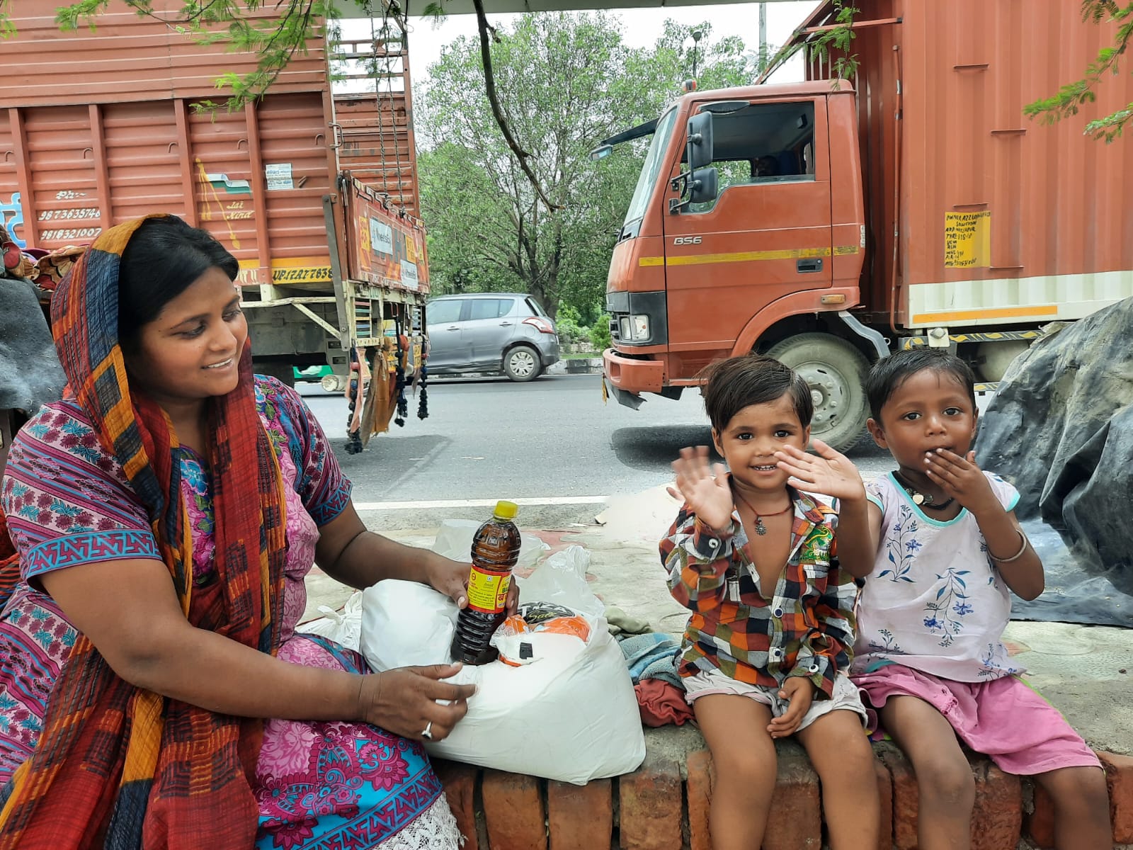 Mother and children receiving ration